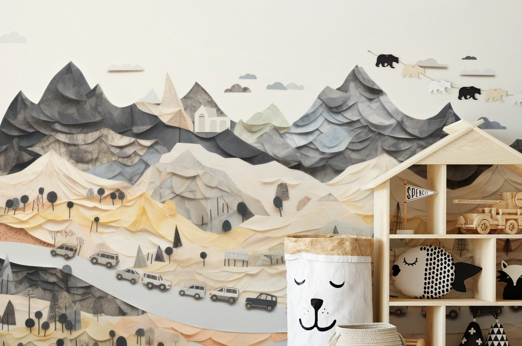 "Artistic Mountain Town Mural in Child's Playroom Featuring Wooden Toys and Neutral Decor"