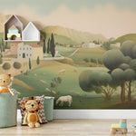  Interior design featuring a pastoral landscape mural in a child’s playroom with toys and children's furniture foregrounding.