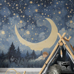 Starry night mural with crescent moon in a playful child's room with teepee and toys