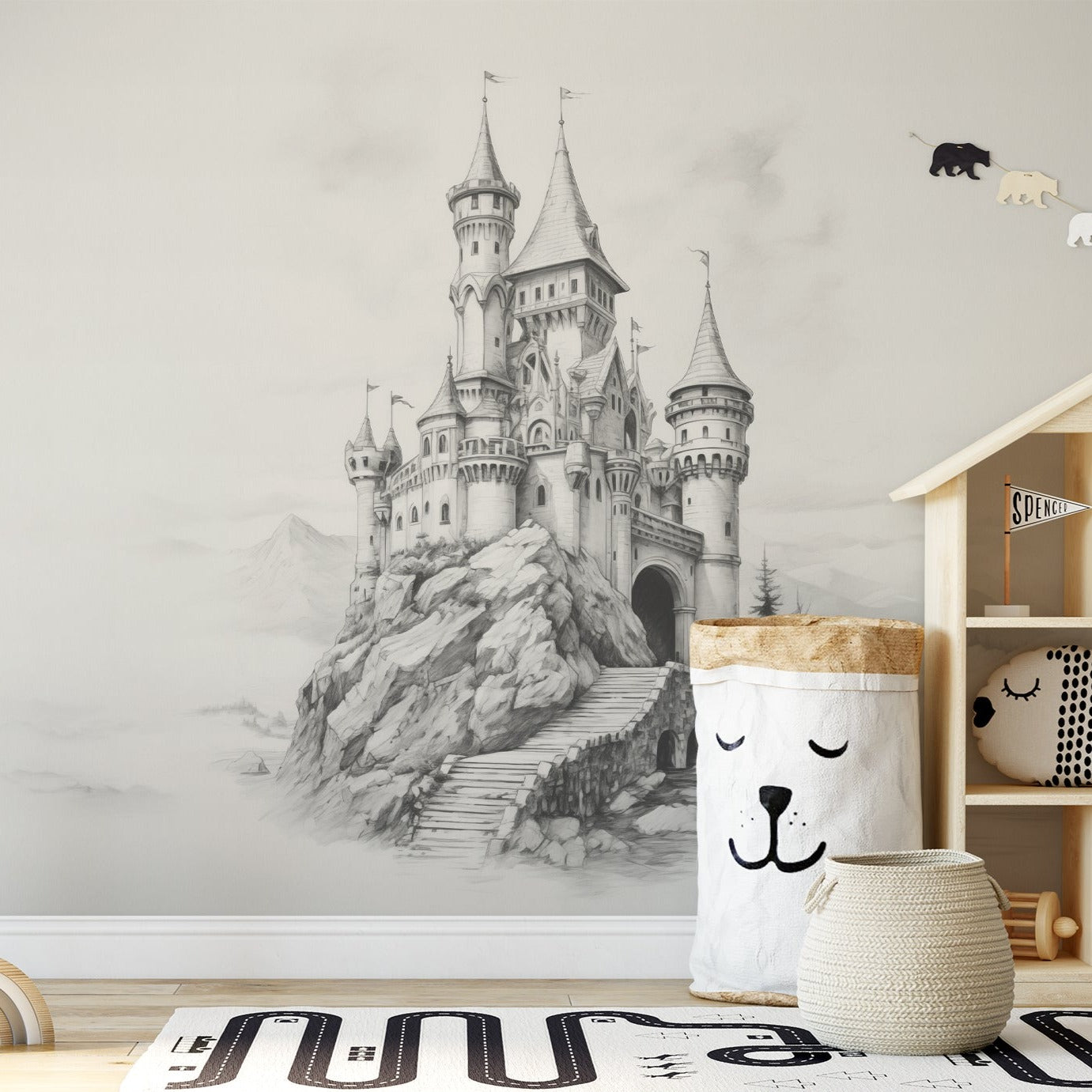 Cloud Castle wallpaper mural in a child's room with a bunny chair, toy storage, and play area.