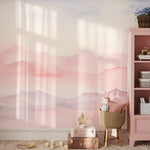 Child’s play area decorated with Pastel Mountain Mural, featuring soft pink and gray mountains."