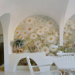 Daisy Field wallpaper mural in a modern dining area with white furniture.