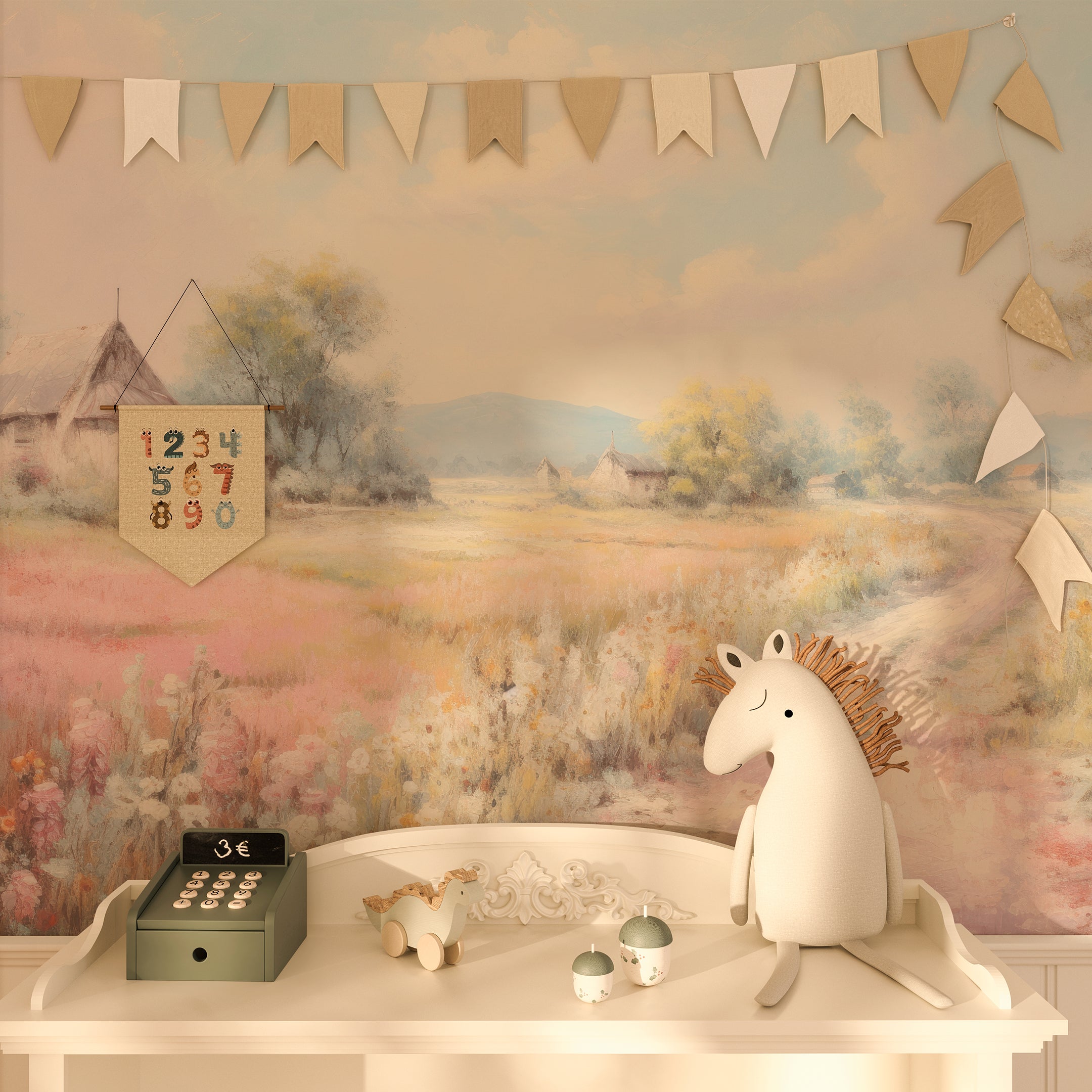 The 'Country Road Mural' wallpaper in a children's room setting, featuring a whimsical design with a dirt path winding through wildflower meadows towards quaint cottages. The mural's pastel tones and serene countryside scene provide a calming background for playful decor.