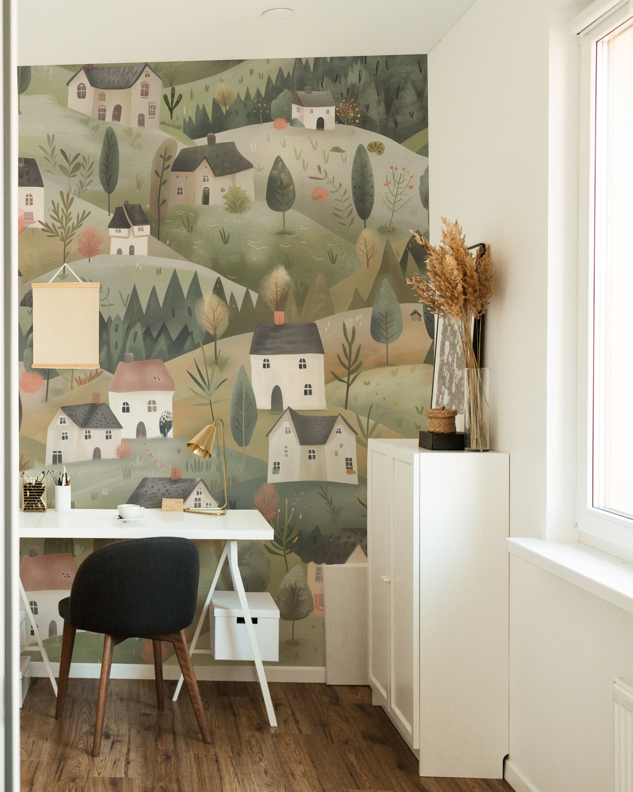  Hillier Mural wallpaper installed in a room, creating a serene countryside atmosphere with houses and greenery.