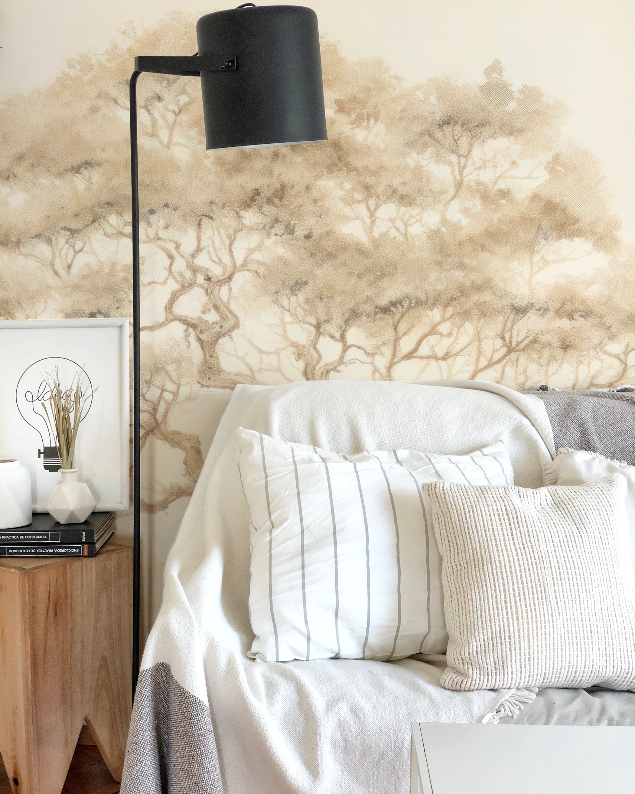 Neutral tree sketch mural used as a backdrop in a cozy living space, highlighting the detailed branches and textured foliage of the tree, paired with minimalistic decor.