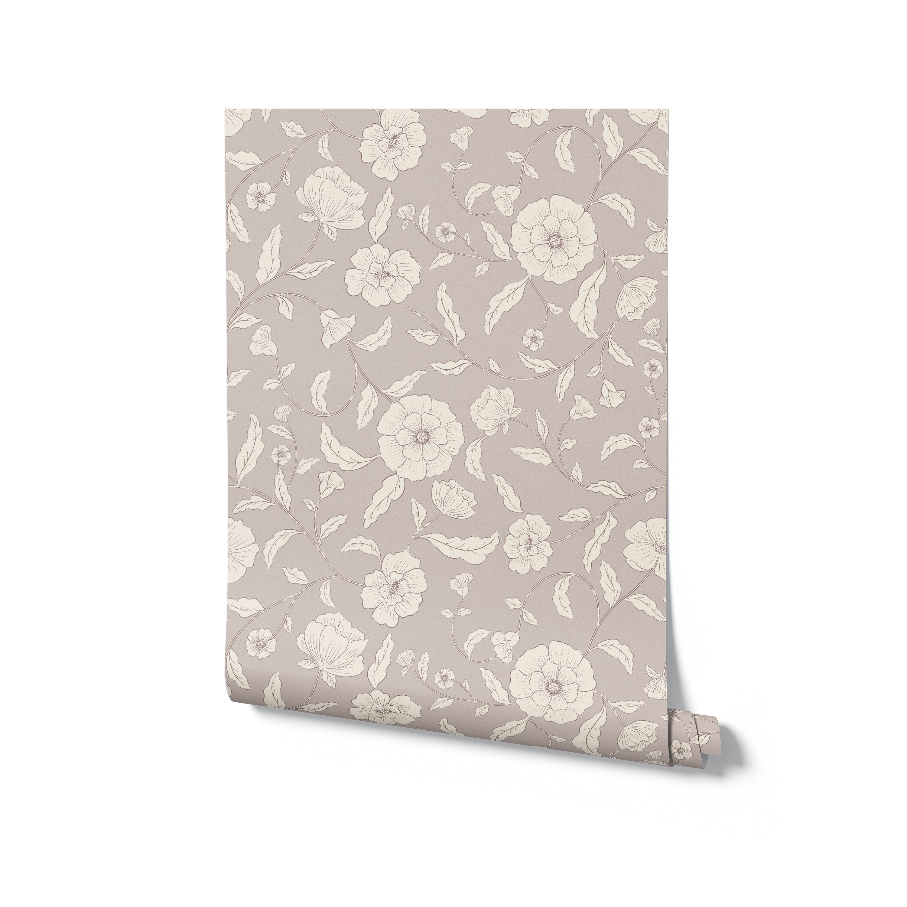 A roll of Petit Champlain Wallpaper displaying its large floral pattern in greyed lavender. The wallpaper is neatly rolled, highlighting the detailed and refined design, perfect for adding a touch of elegance to any room