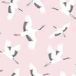 Close-up view of the 'Kids Crane Wallpaper' showing graceful white cranes soaring across a pale pink backdrop, evoking a sense of freedom and tranquility
