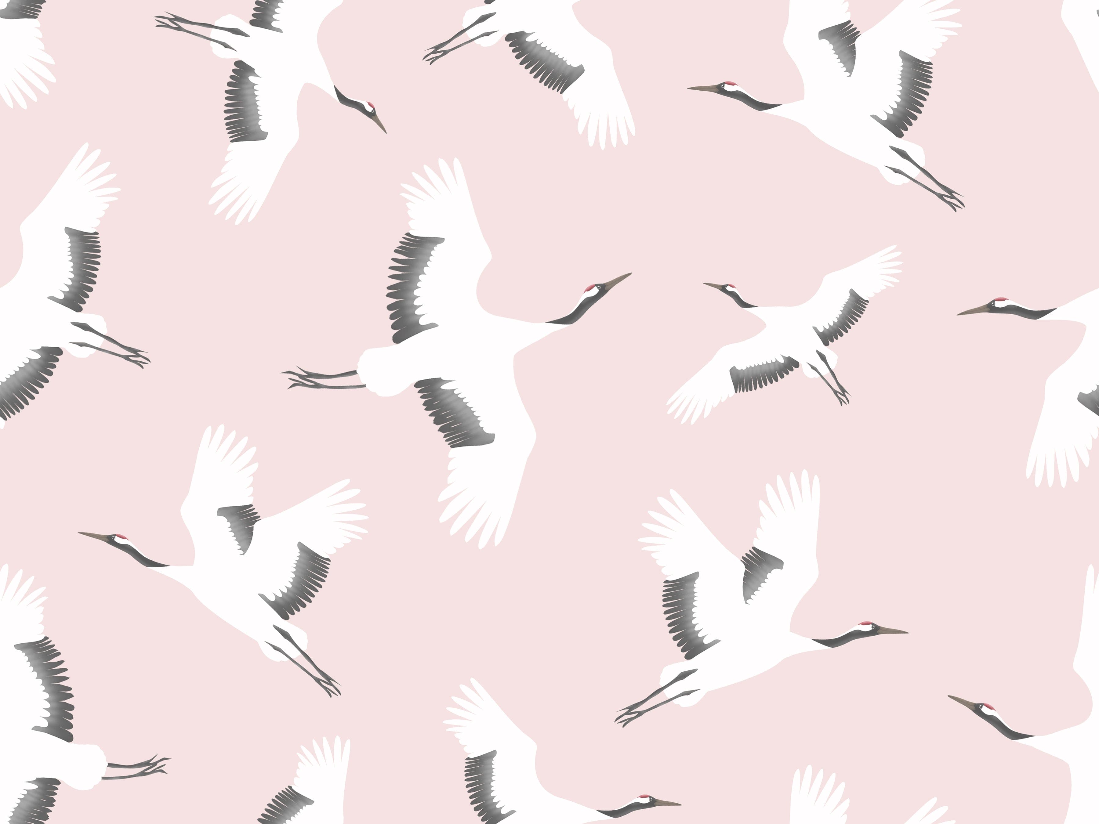 Close-up view of the 'Kids Crane Wallpaper' showing graceful white cranes soaring across a pale pink backdrop, evoking a sense of freedom and tranquility
