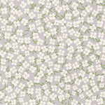Roll of floral wallpaper with small white flowers on a light gray background