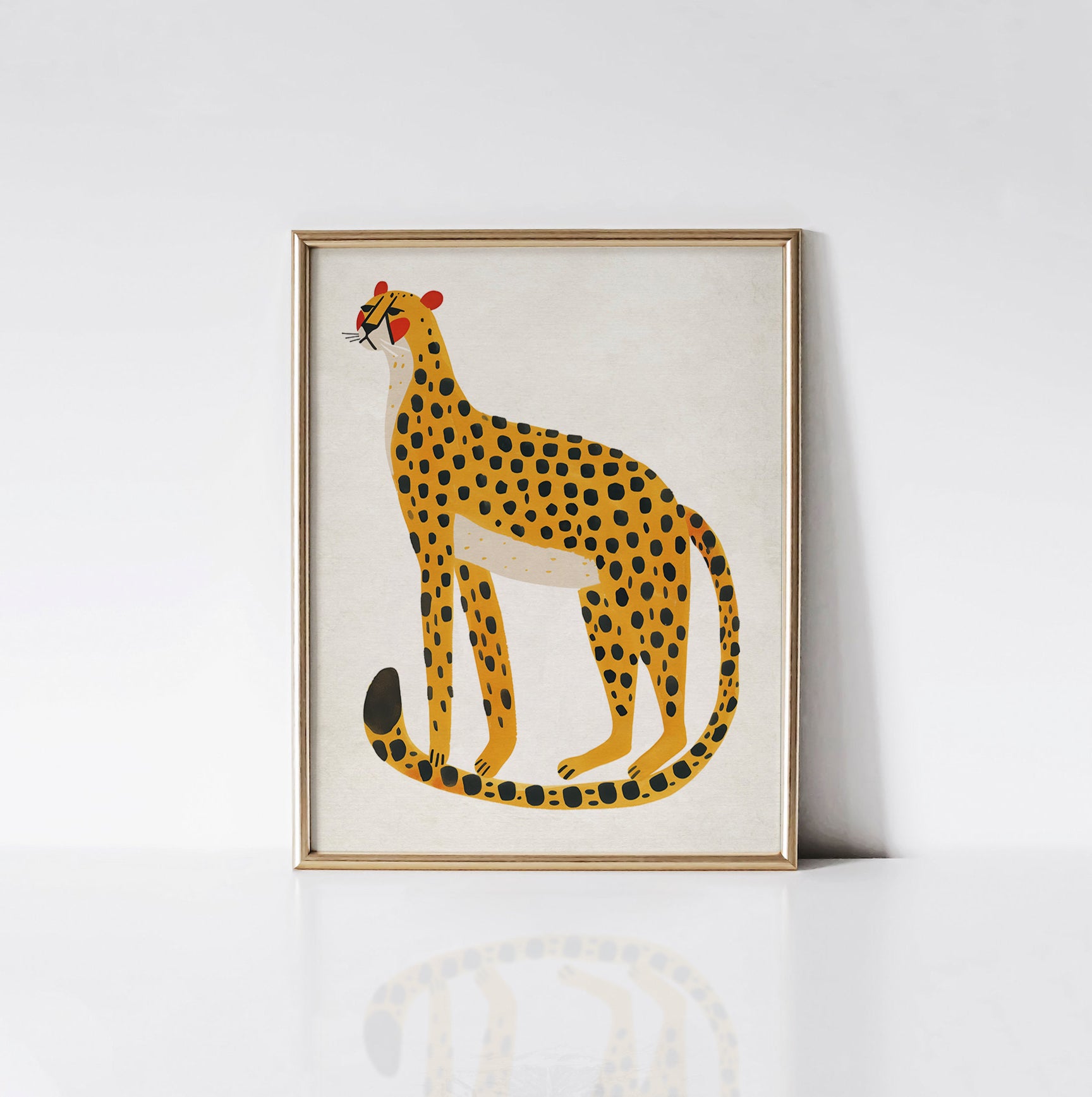 Bold Cheetah Art Print from Timberlea Interiors Kids Art Print Collection displayed in a gold frame, showcasing a vivid yellow and black cheetah illustration.