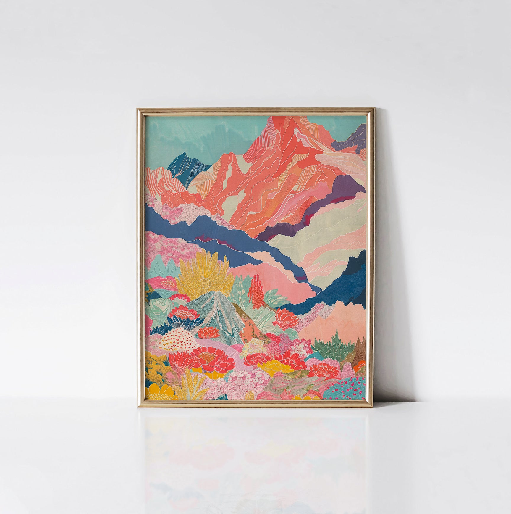 Mountain Bloom Art Print framed in an elegant gold frame, showcasing a dynamic mountain scene adorned with colorful blooming flowers in pink, blue, and yellow