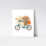Puppy Pals Bicycle Ride Art Print from Timberlea Interiors Kids Art Print Collection mounted on a wood board, featuring two cute puppies riding a tandem bicycle with vibrant details.