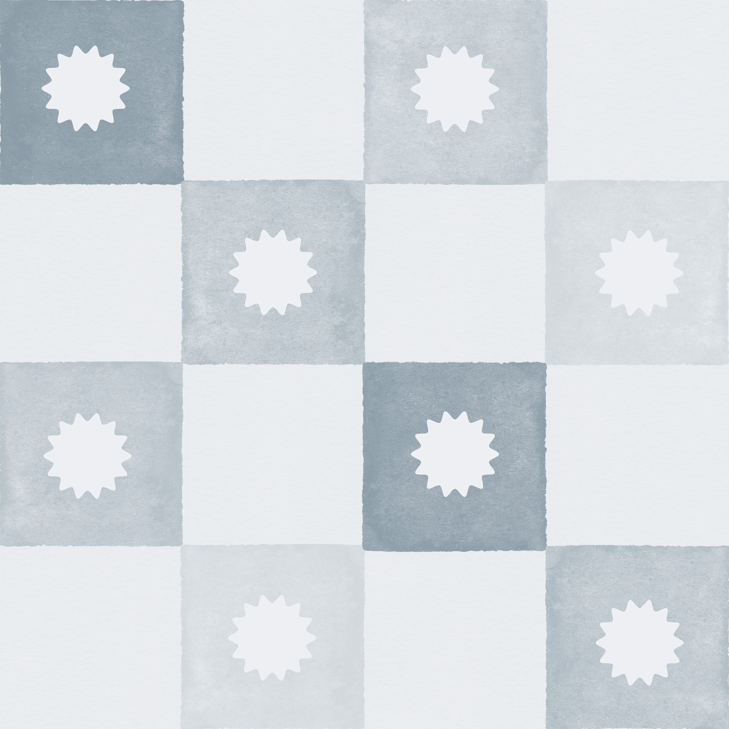 Close-up of the Coralie Wallpaper in pale blue displaying a watercolor-style checkered pattern. Each square alternates between white and pale blue, with a pale blue sunburst motif centered in each square