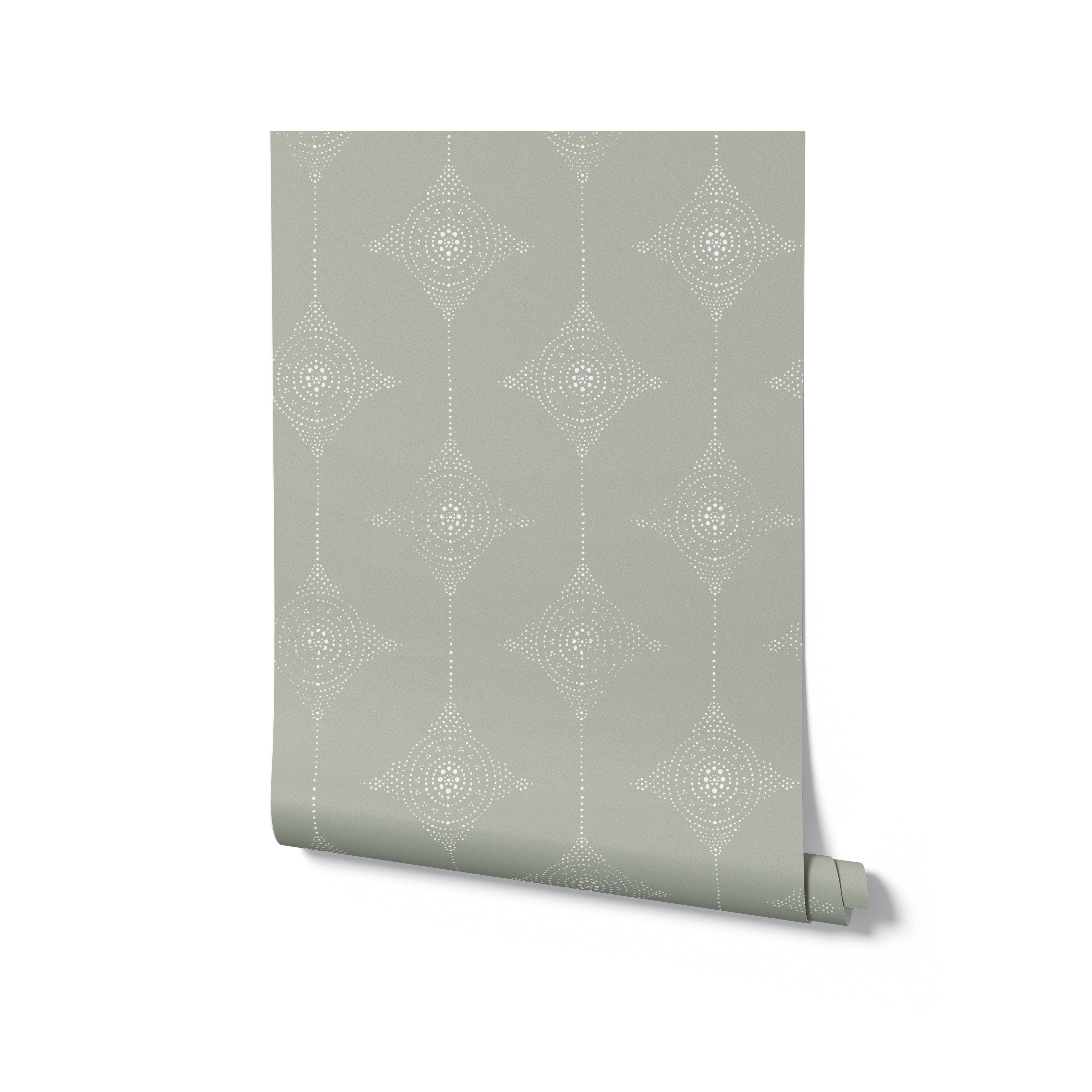 A rolled-up section of the Serenity Circles Wallpaper, displaying the continuous pattern of white circular designs arranged in diamond shapes on an olive green background. The image illustrates the wallpaper's refined and harmonious aesthetic.