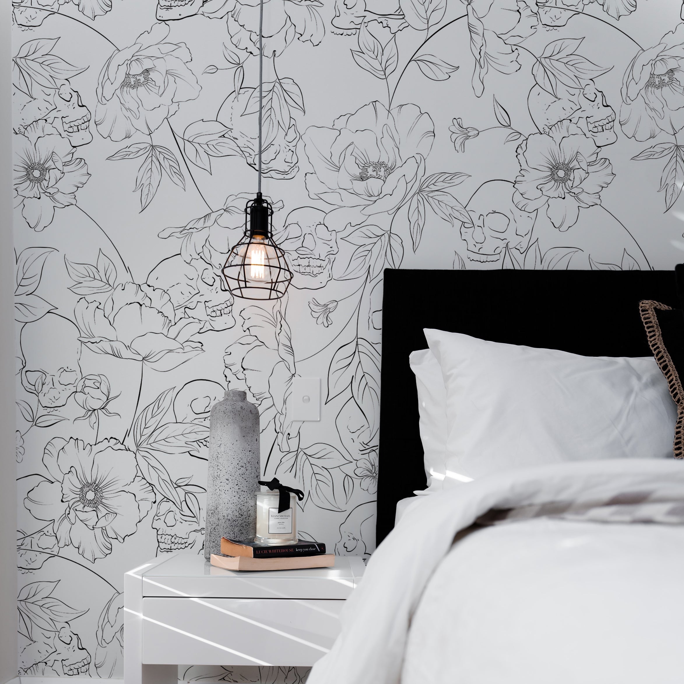 Modern bedroom featuring Dainty Skull Floral Wallpaper, where light floral sketches with hidden skulls create a serene yet intriguing ambiance, complemented by simple, contemporary furniture