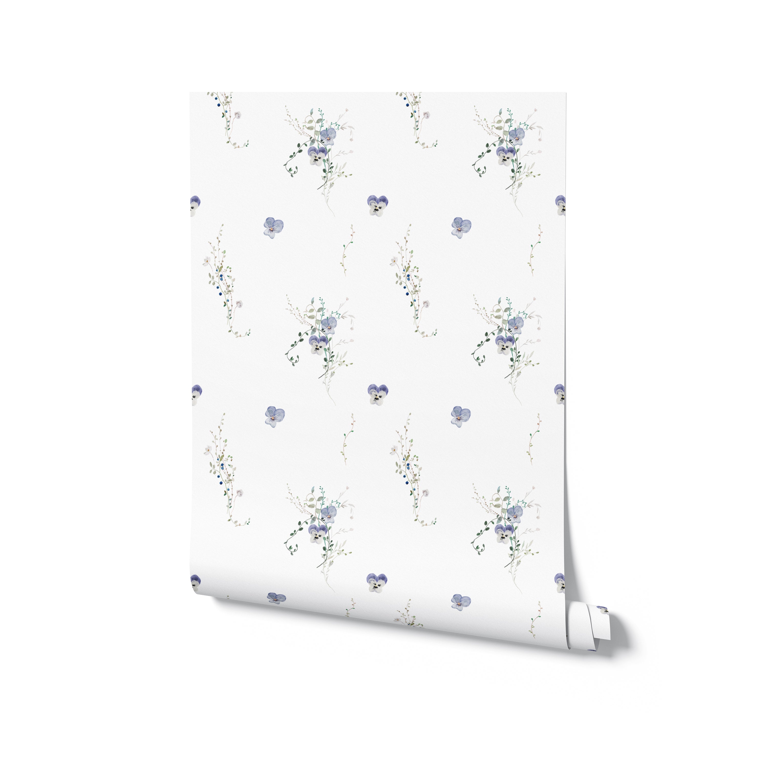 A roll of Delicate Blue Wildflower Wallpaper reveals its charming and detailed botanical print. The light background adorned with delicate blue flowers and soft green leaves offers a fresh and inviting look for a room update