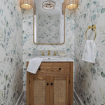 Luxurious bathroom accented with Green Leaves and Branches Wallpaper, wooden vanity, and warm lighting, offering an organic, spa-like retreat.