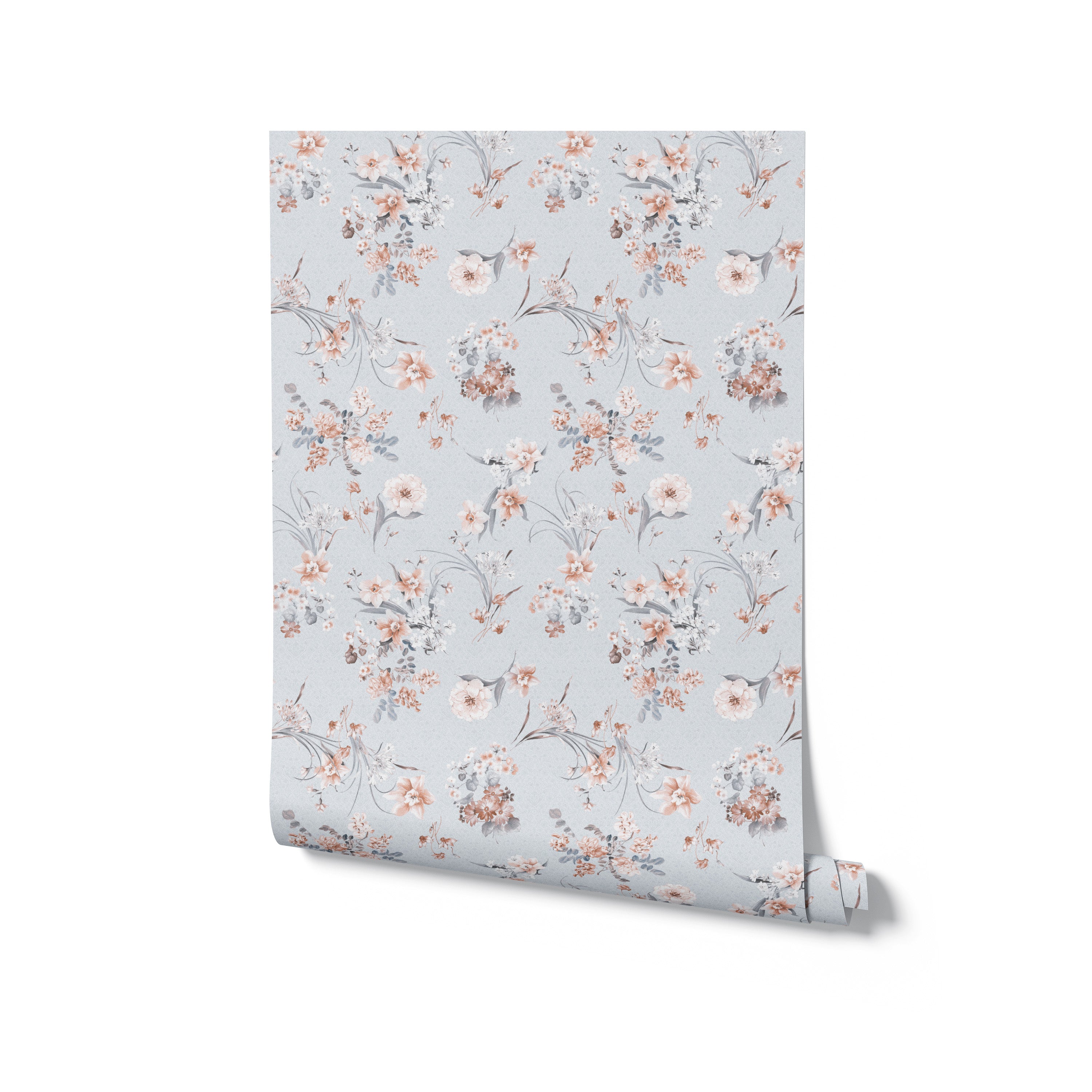 A roll of the Boudoir Blooms Wallpaper unrolled slightly to show the beautiful floral pattern. The wallpaper features a continuous design of delicate flowers and leaves in soft peach and gray, ideal for adding a romantic and soft atmosphere to any room.