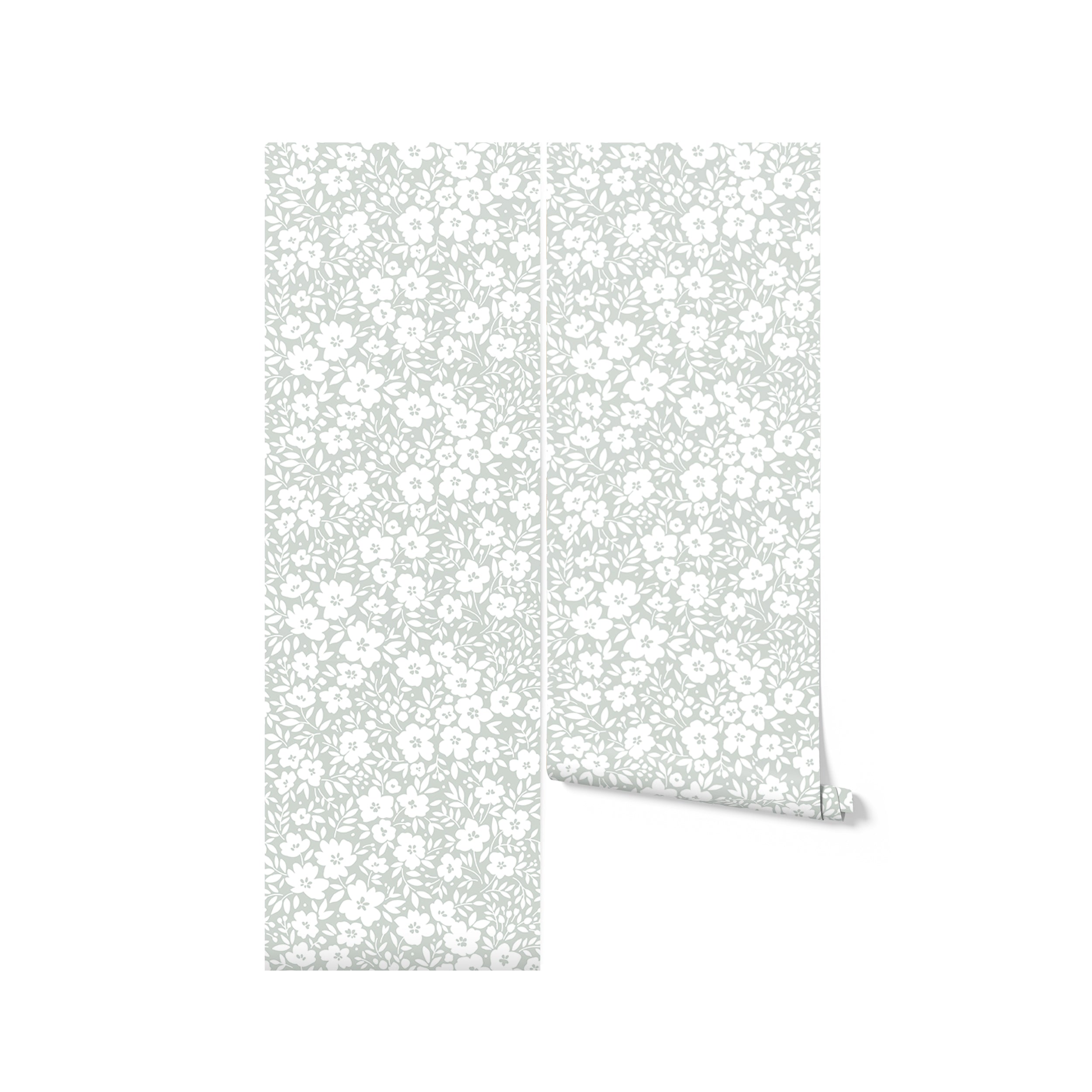 Roll of Flower Power Wallpaper in Light Sage, ready for application, showcasing the soothing sage color and white floral design that brings a gentle, organic vibe to any room.