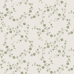 A close-up of the Charming Floral Wallpaper-Moss, displaying a detailed and seamless pattern of small green flowers and leaves, set against a soothing beige background that evokes a feeling of nature's calm.