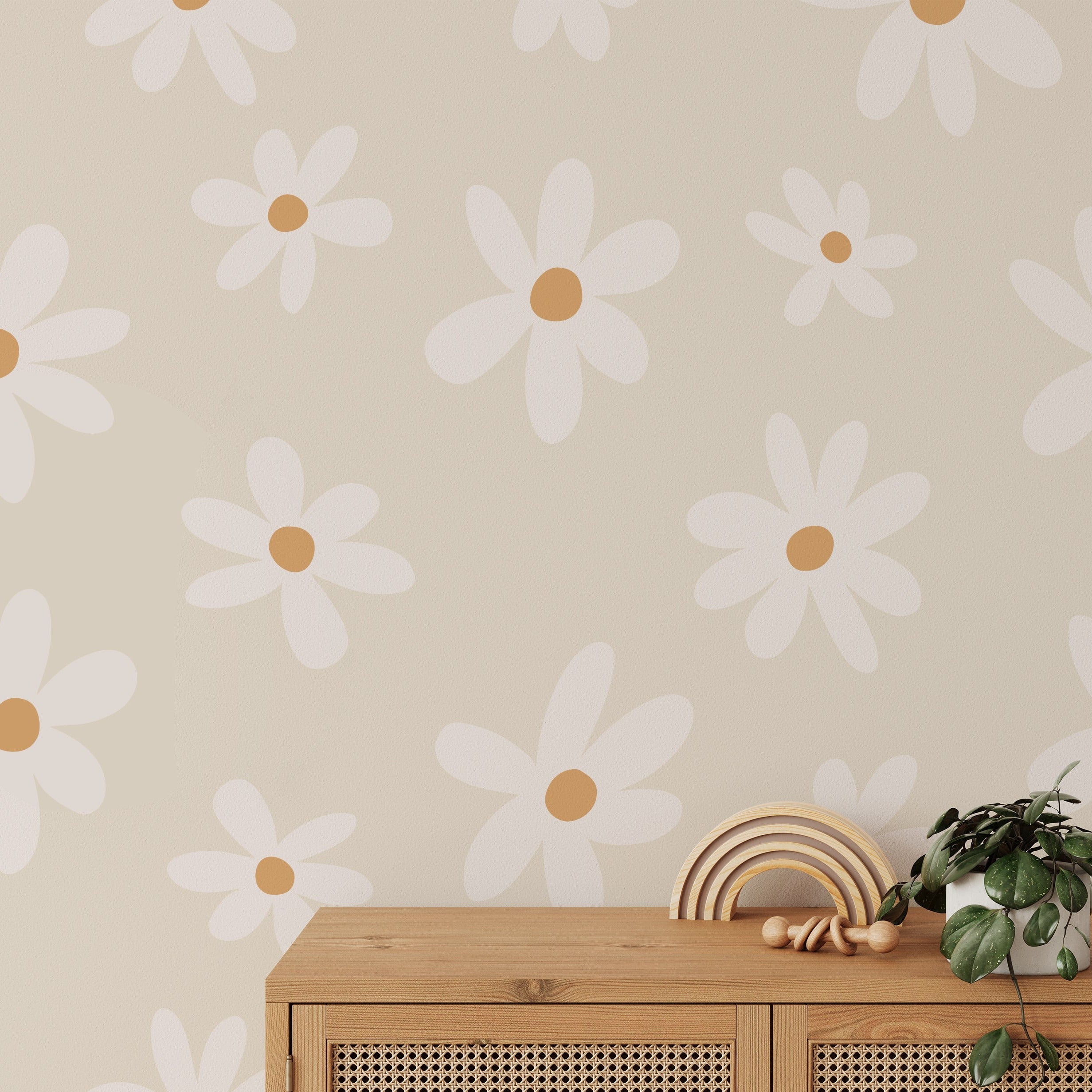 A warm and welcoming interior featuring the Simple Daisy Wallpaper, with its pattern of large, white daisies on an ecru background enhancing the room's natural light and complementing the wooden decor and green houseplants