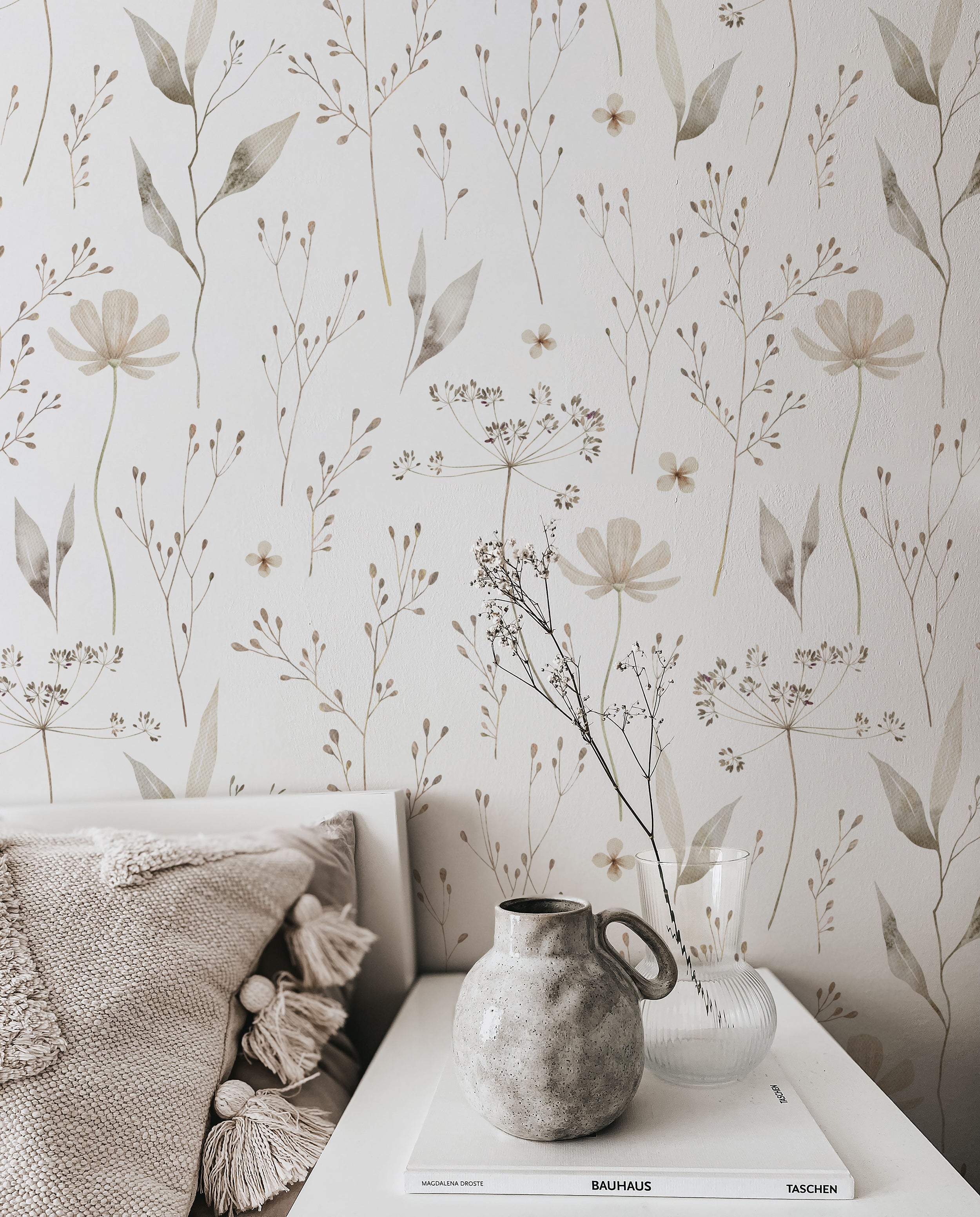 An elegant setting with Tranquil Bloom Wallpaper, where the intricate flower and leaf designs add a soothing and sophisticated touch to the decor, enhancing the room's overall ambiance of relaxation and comfort.
