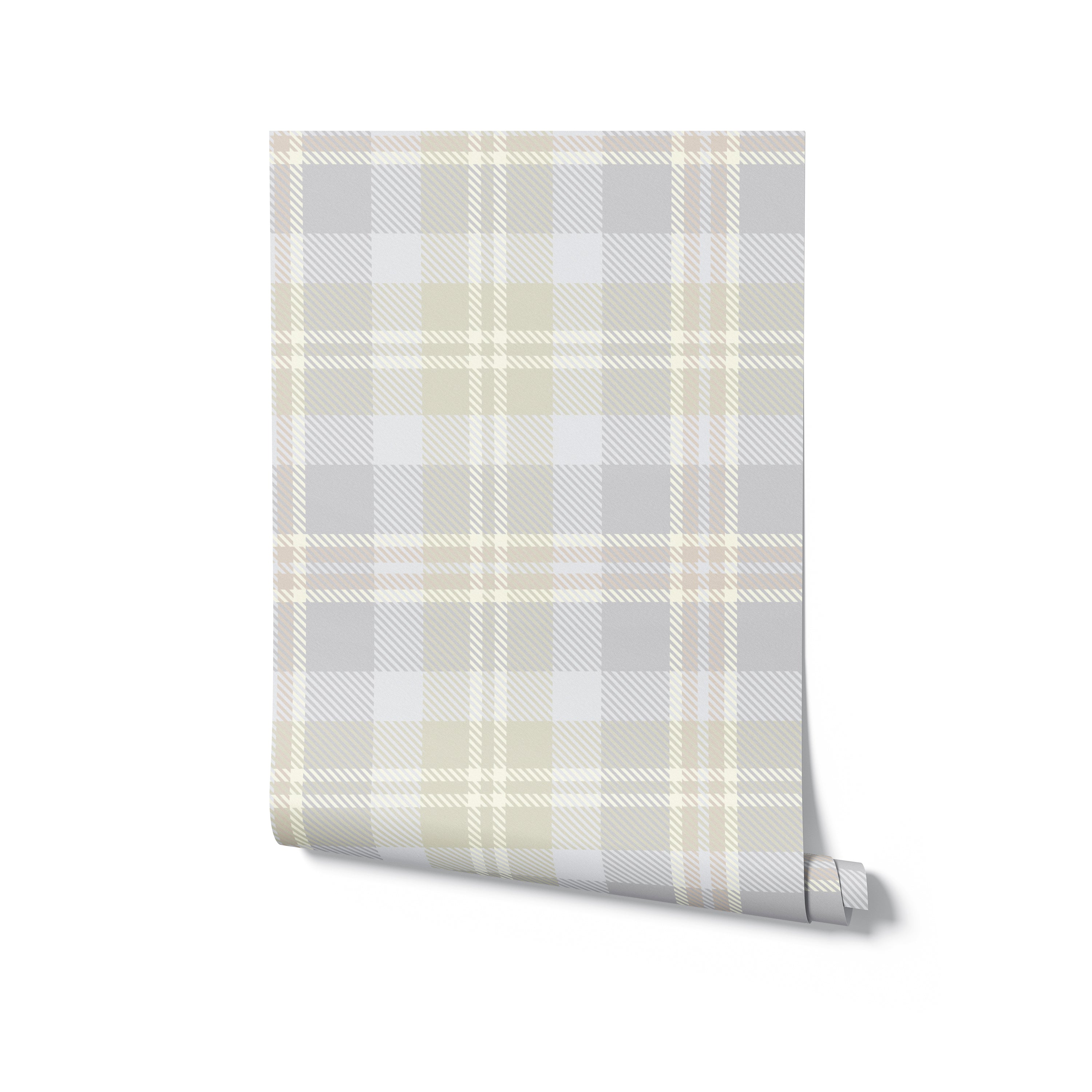 Sample roll of Heirloom Tartan Plaid Wallpaper, featuring a classic tartan pattern in shades of gray, beige, and white. Ideal for adding a touch of traditional charm to any room.