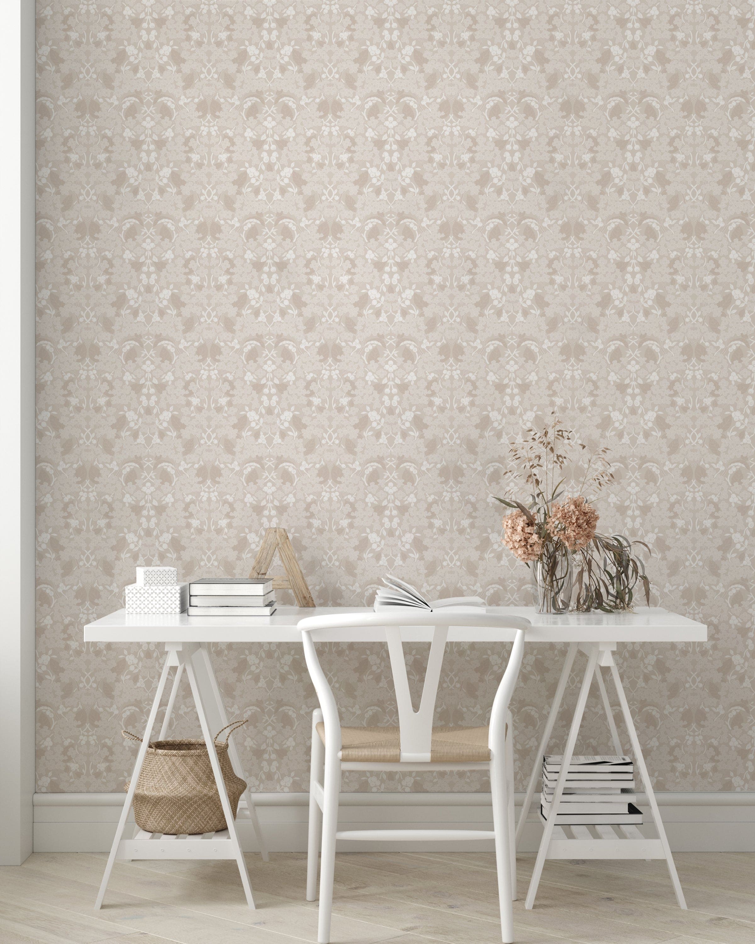 A minimalist workspace with Linen Morris Wallpaper as the backdrop. The light beige floral wallpaper complements the white modern desk and chair set, enhanced by natural wood accents and dried flowers for a calm, productive environment
