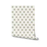 Roll of wallpaper with a geometric pattern on a white background