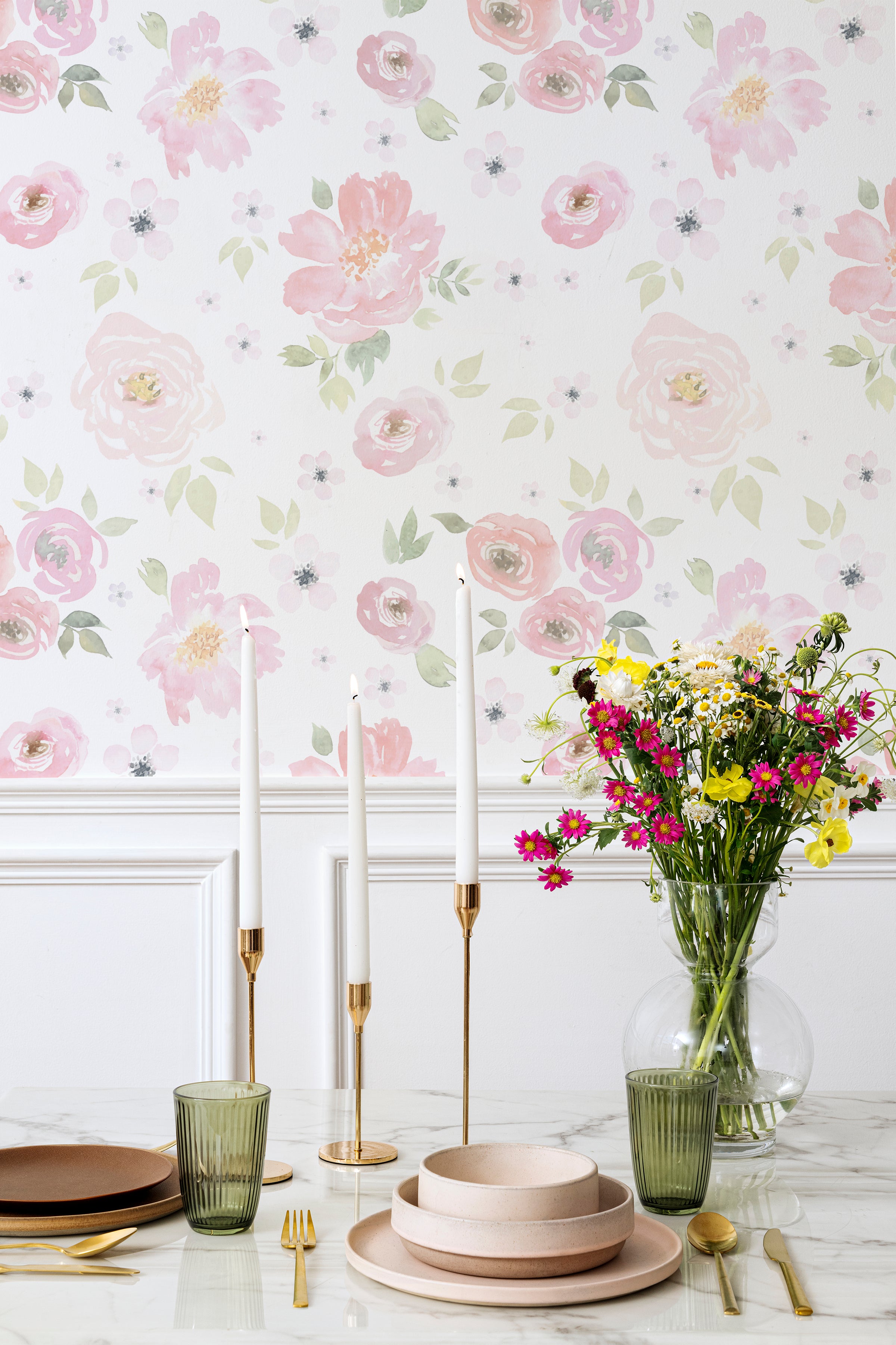 A close-up view of the Gentle Blossom Wallpaper - 25", displaying a delicate watercolor design of large pink and peach flowers with light green foliage. The soft pastel colors and floral arrangement provide a peaceful and elegant look, suitable for enhancing the beauty of any room.