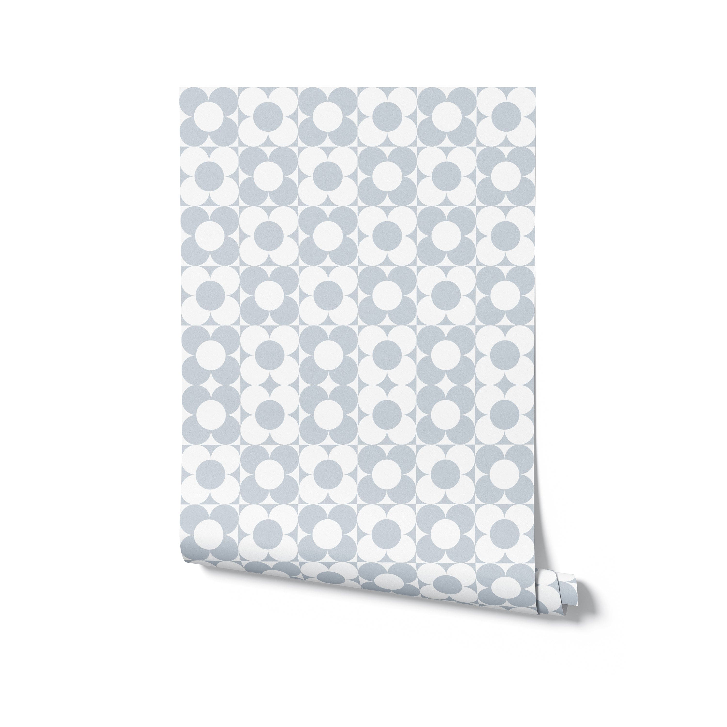 Single roll of Vintage Groovy Wallpaper - Pale Blue displayed against a plain background, highlighting the groovy circular patterns in soft blue and gray tones, ideal for adding a touch of vintage charm to any room