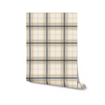 Roll of plaid wallpaper with beige and gray pattern on a white background