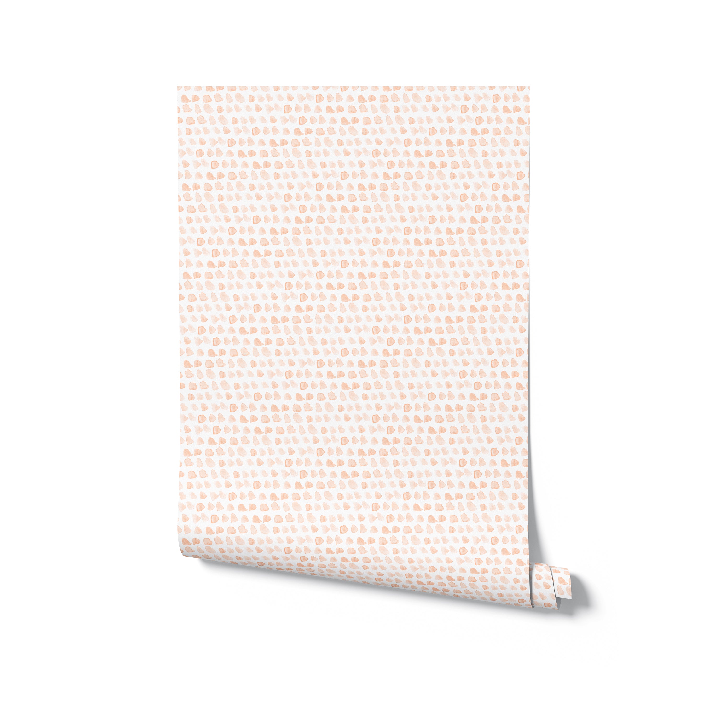 A roll of Hand Painted Dots Wallpaper in Peach Fuzz, partially unrolled to display the whimsical dot pattern in peach on a light background, perfect for adding a touch of light-hearted fun to rooms needing a gentle splash of color