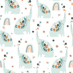 Nursery Bloom Wallpaper featuring mint green elephants with floral designs and small rainbows on a white background.