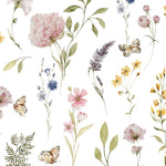 The Floral Fields Wallpaper displays a rich tapestry of blooming flowers, fluttering butterflies, and sprigs of greenery set against a crisp white background, providing a vibrant, naturalistic feel that captures the essence of a spring meadow.