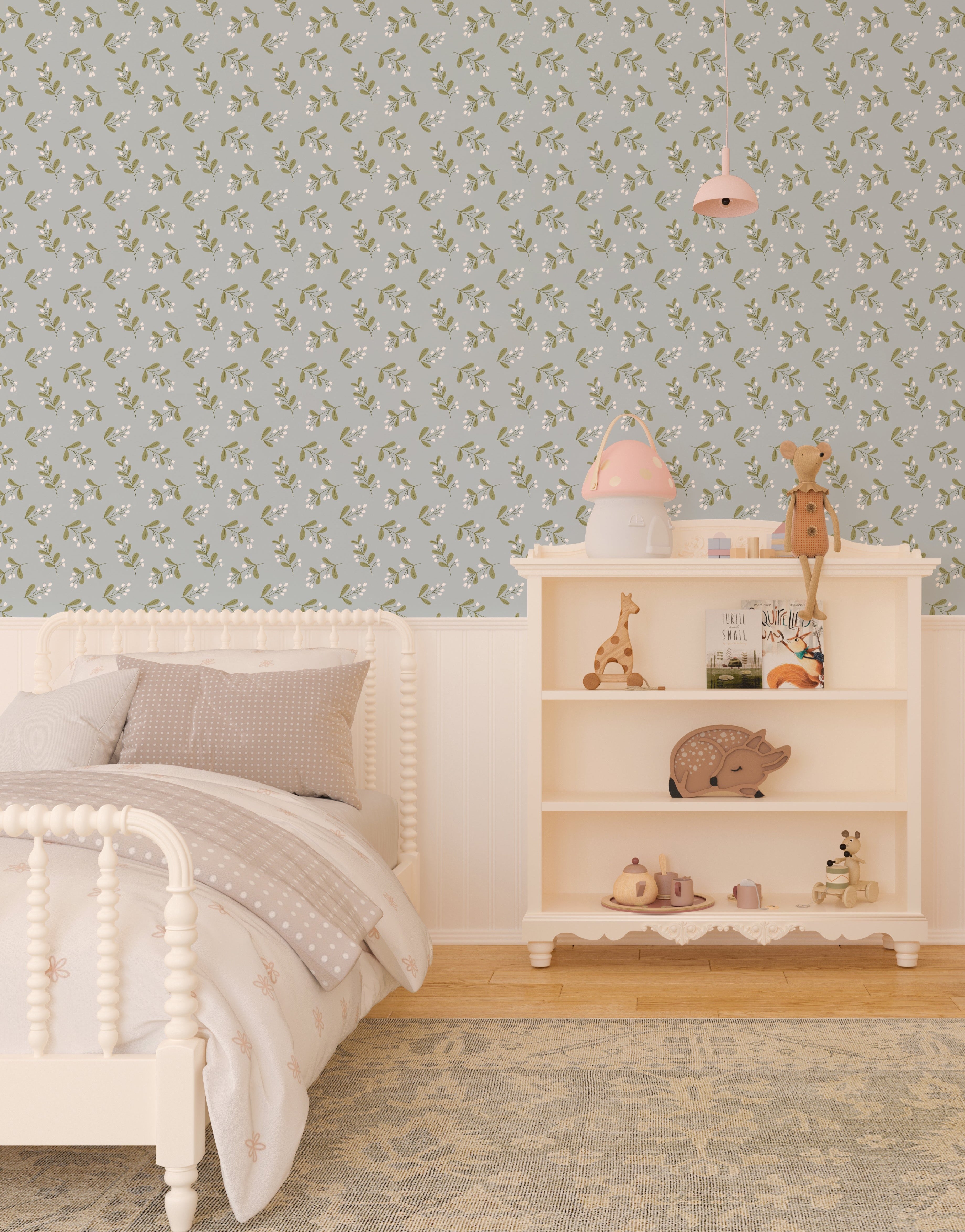Interior view of a child's bedroom with Simple Floral Wallpaper - 12.5" on the feature wall. The wallpaper displays a charming pattern of small white flowers and green foliage on a soft blue background, enhancing the room's cozy and playful decor.