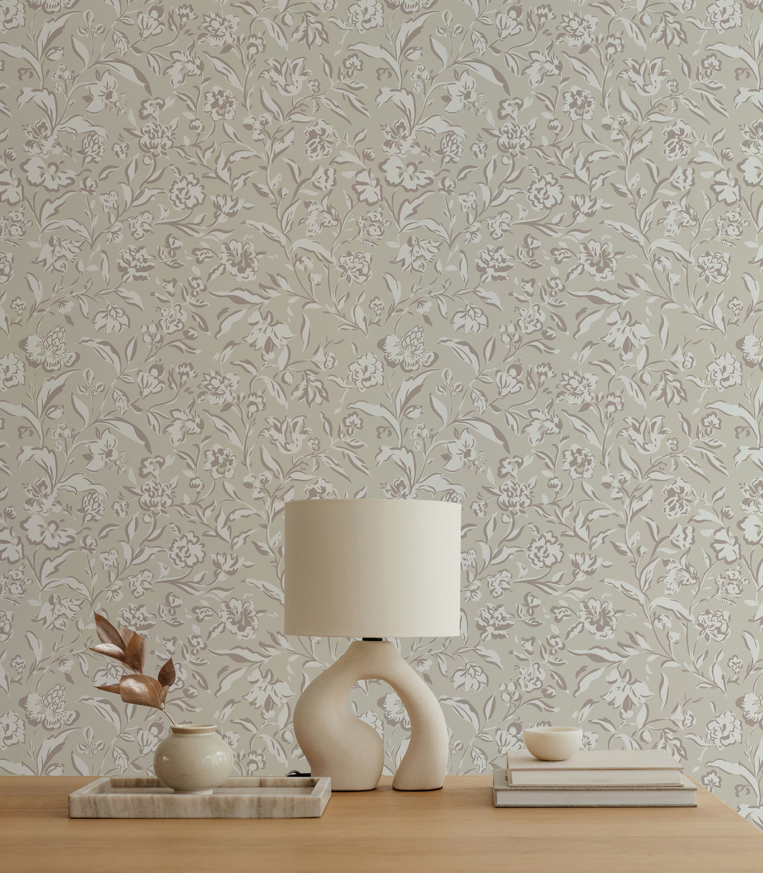 A close-up view of the Boho Sketchy Floral Wallpaper, highlighting its intricate design of delicate flowers and leaves in a monochrome beige palette. The detailed sketch style brings a modern yet timeless feel to any room.