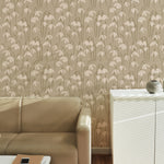 Modern living space with the "Snowdrop Wallpaper - 25" enhancing the walls, creating a calm and refined atmosphere. The wallpaper’s gentle floral pattern pairs beautifully with contemporary furniture, including a beige sofa and minimalist storage units, ideal for a stylish, tranquil home.