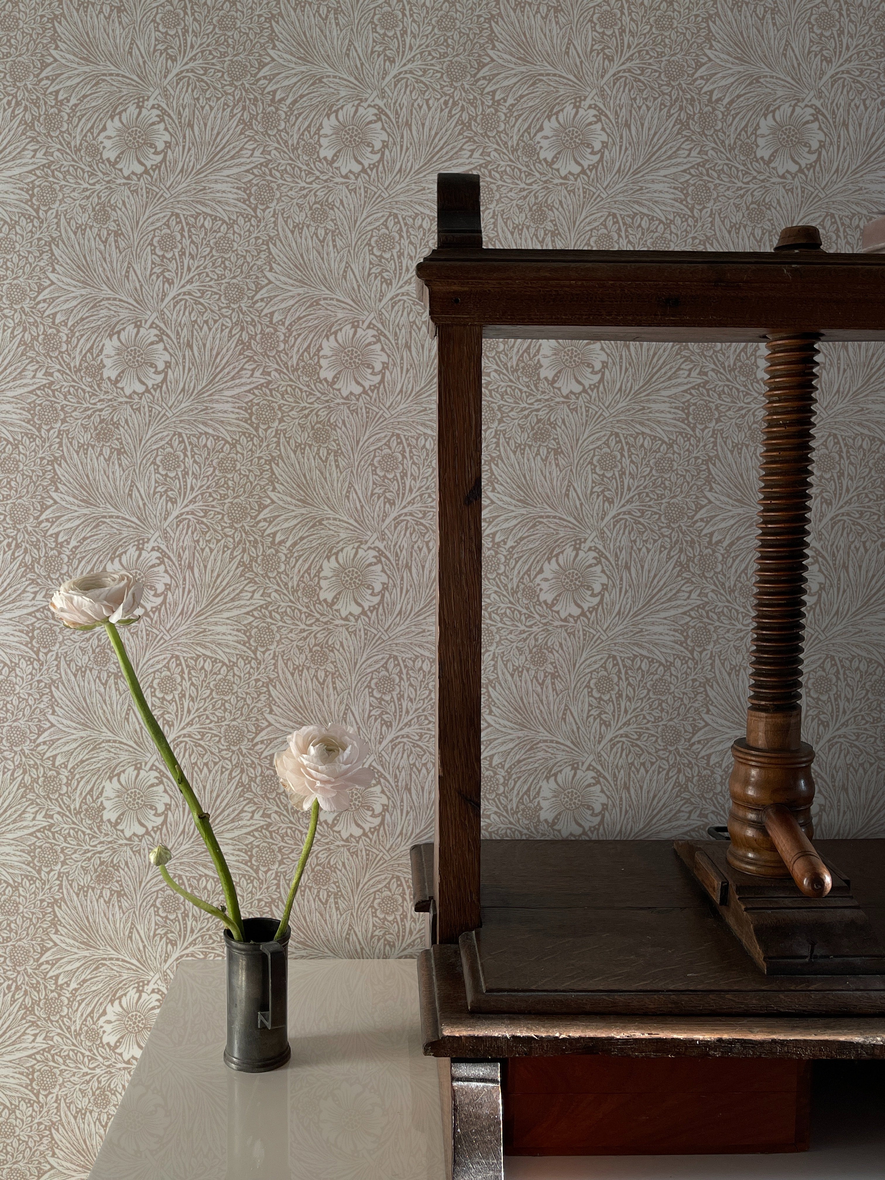Sophisticated home office setup featuring Timeless Floral Wallpaper with beige floral motifs, enhancing the wooden desk and classic lamp aesthetics.
