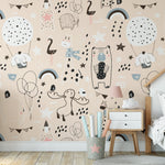 Full view of a child’s bedroom wall decorated with Timberlea Interiors animal doodle wallpaper, showing a seamless pattern integration in a cozy room setting."