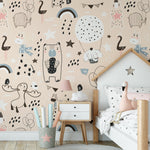 "Decorated kids' room featuring Timberlea Interiors whimsical animal doodle wallpaper in soft beige, enhancing a playful and creative space."