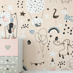 Close-up view of Timberlea Interiors animal doodle wallpaper in a children's room, highlighting quirky animal characters and playful patterns.