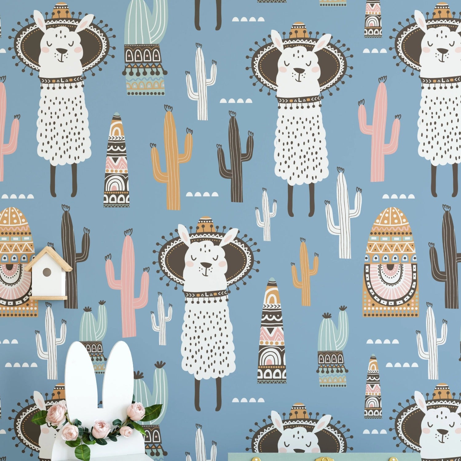 Full view of playful llama wallpaper with detailed desert-themed designs and pastel colors in a nursery.