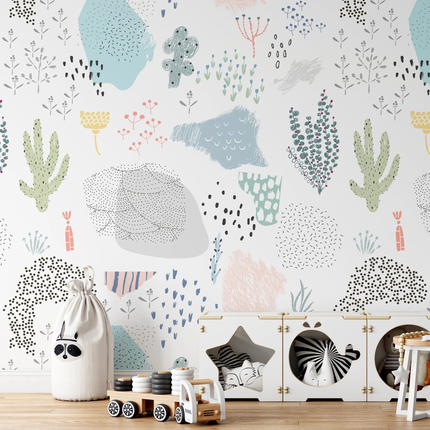 Children's room decorated with Kids Wallpaper - Doodles, showcasing playful doodles of plants, cacti, and abstract shapes in soft pastel colors on a white background.