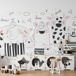 Spacious kids room featuring extensive animal mural with elephant, panda, giraffe, and lama characters