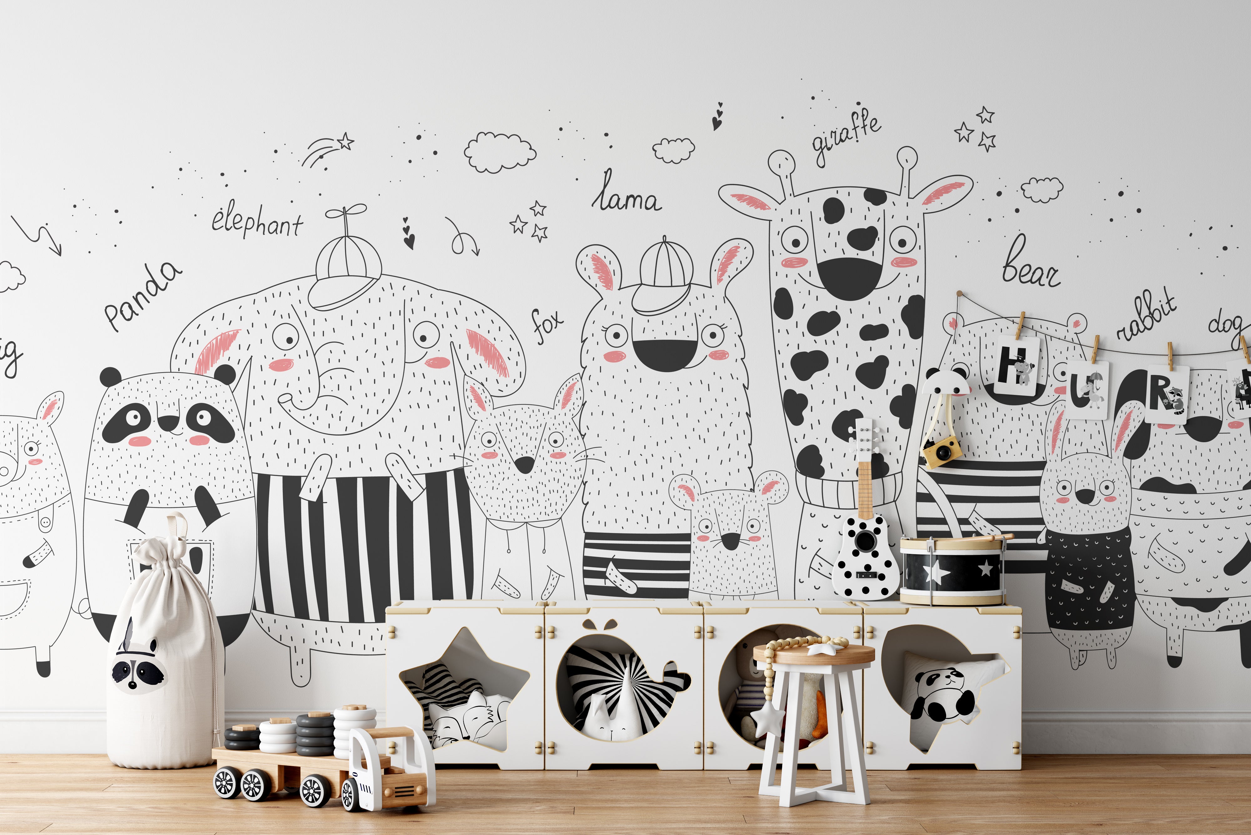 Spacious kids room featuring extensive animal mural with elephant, panda, giraffe, and lama characters