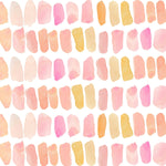 Close-up of the hand-painted wallpaper displaying a pattern of irregularly shaped dashes in shades of pink, peach, and yellow. The texture and watercolor style of the painting give it a soft and inviting appearance.