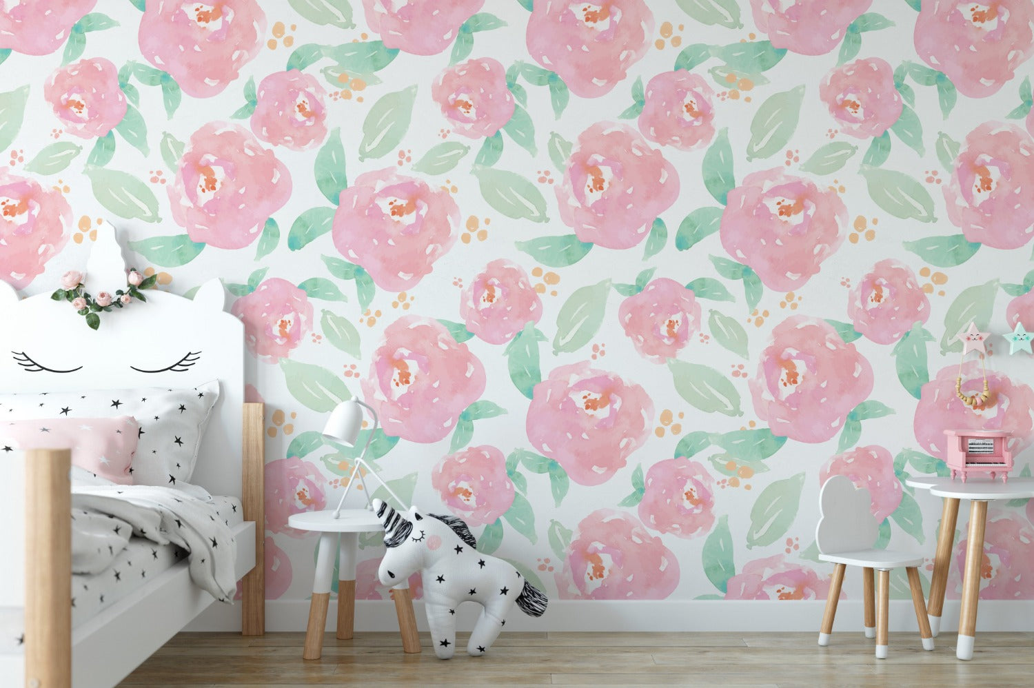 Nursery room decorated with bright nursery floral wallpaper featuring large pink peonies and green leaves