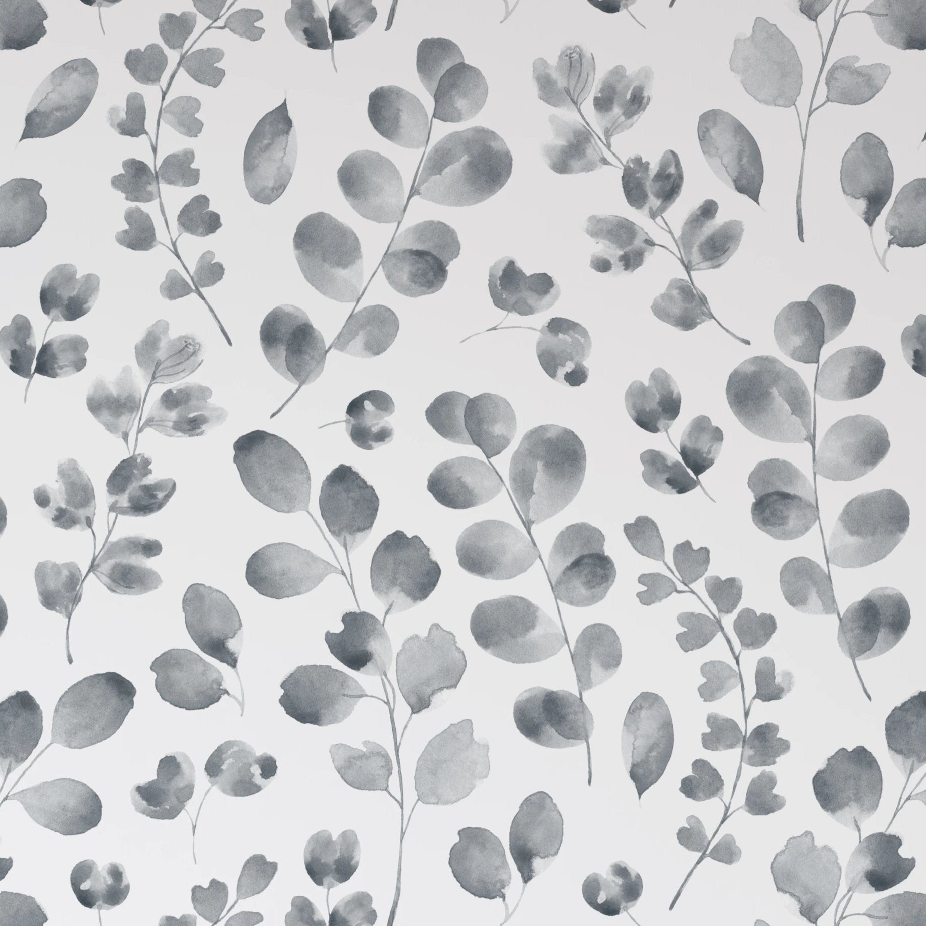 A close-up of the Dark Floral Watercolor Wallpaper showing detailed grey watercolor leaves on a pure white backdrop, offering a tranquil and artistic touch suitable for a variety of interior spaces