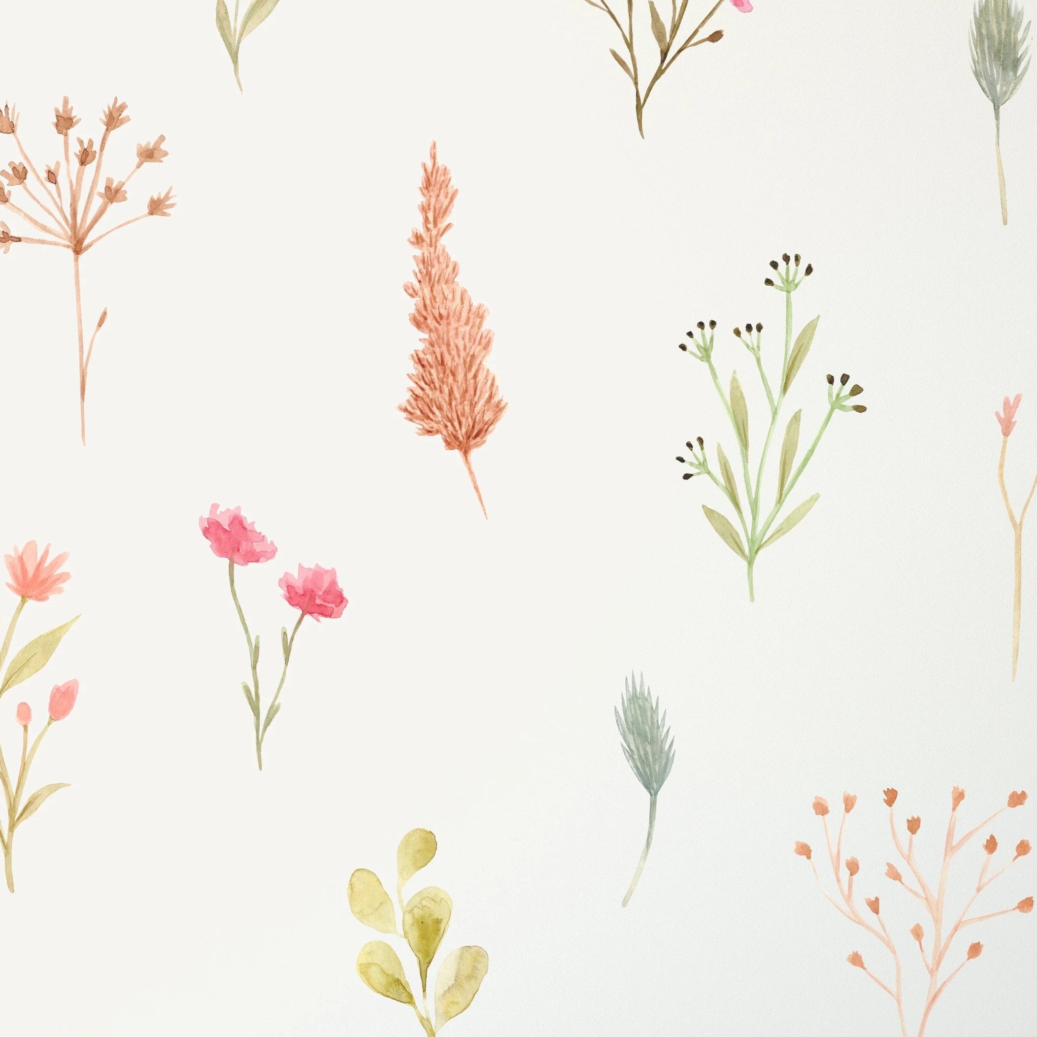 A detailed shot of the Watercolour Floral Wallpaper II showcasing a variety of flowers and leaves in watercolor style, with soft pastels and bright accents creating a dynamic and fresh pattern that brings a lively yet soothing atmosphere to any room.